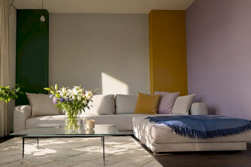 Living room showcasing gray walls with colorful accent walls