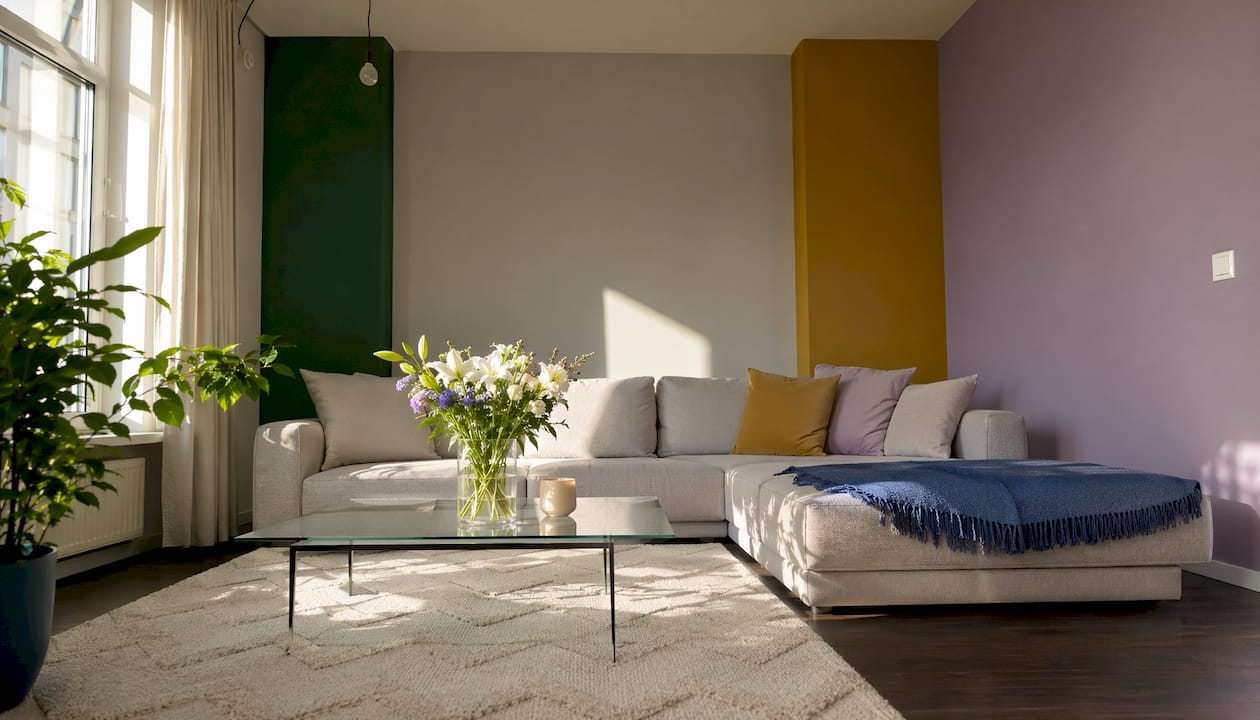 Living room showcasing gray walls with colorful accent walls