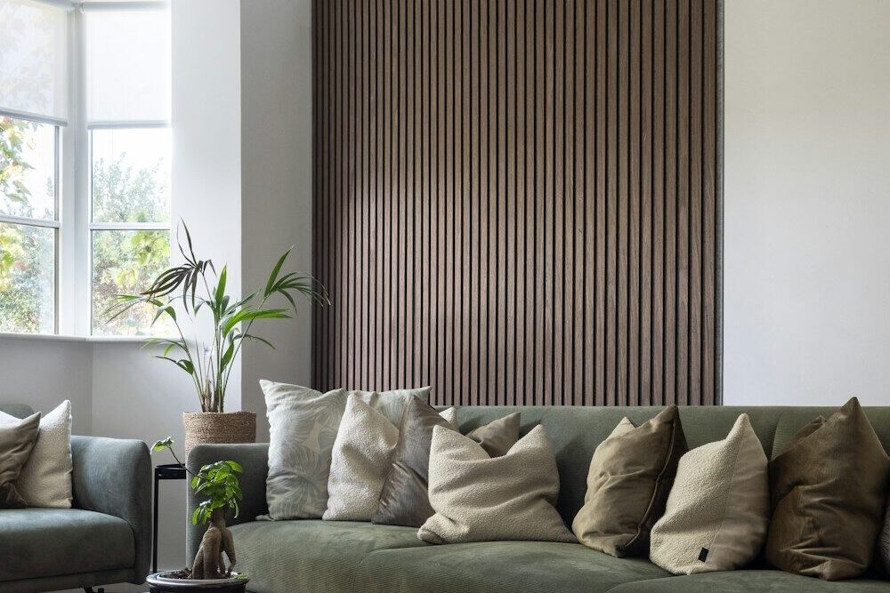 a living room filled with furniture and a large window