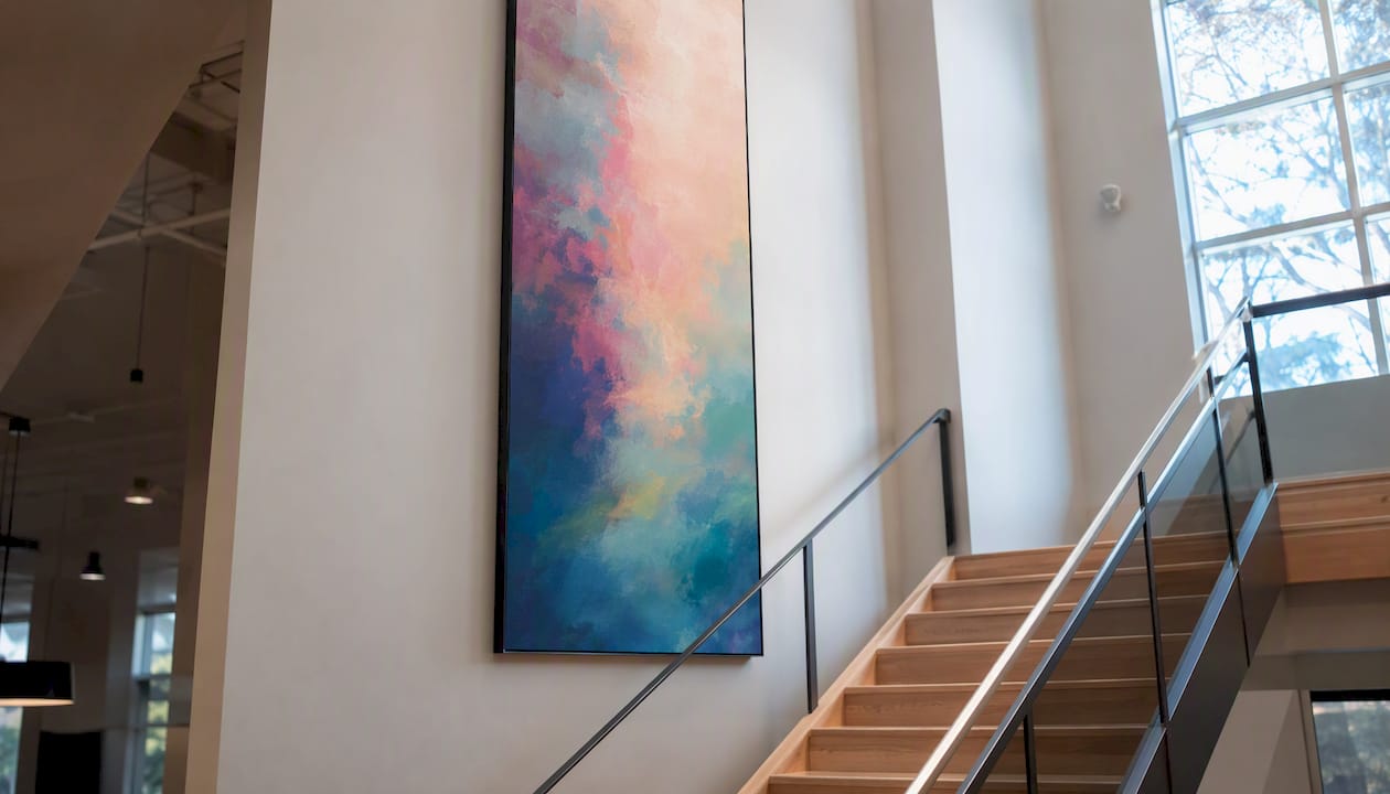 Stairwell with tall vertical oversized artwork