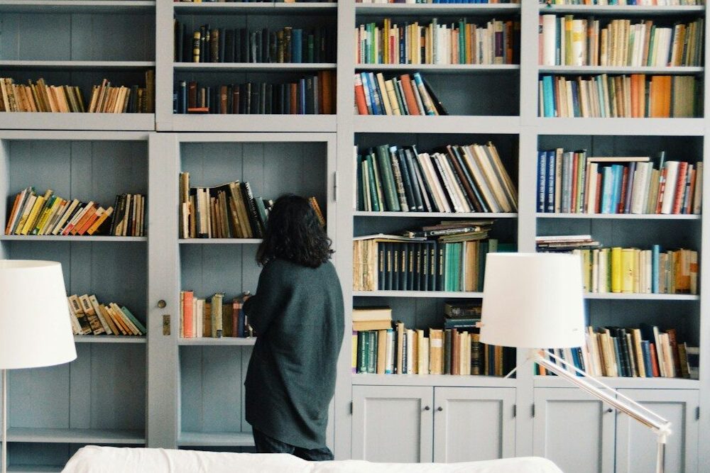 woman finding some book to read