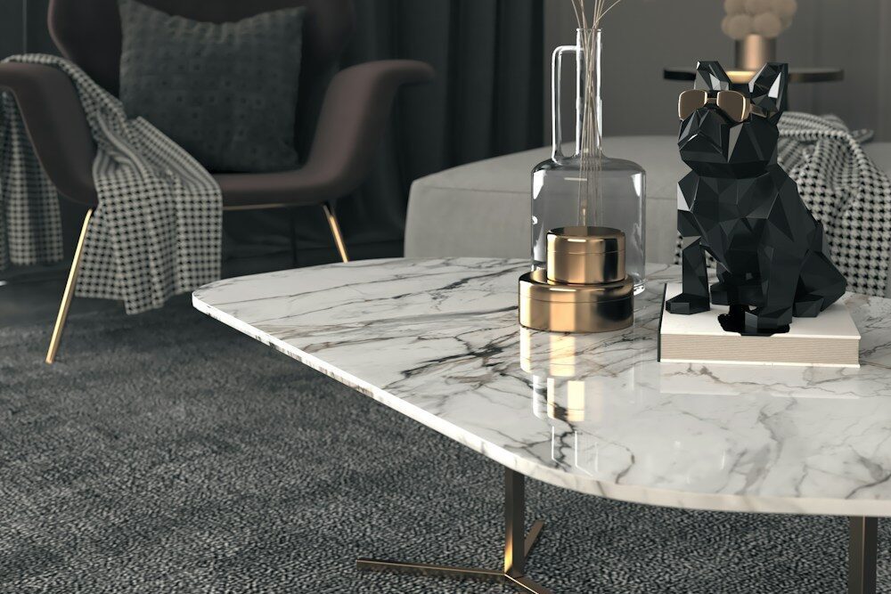 a living room with a marble coffee table