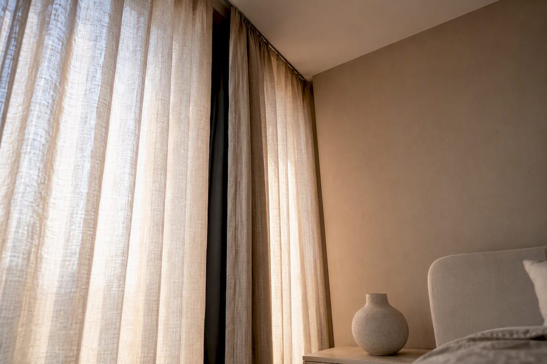 Floor-length layered bedroom curtains
