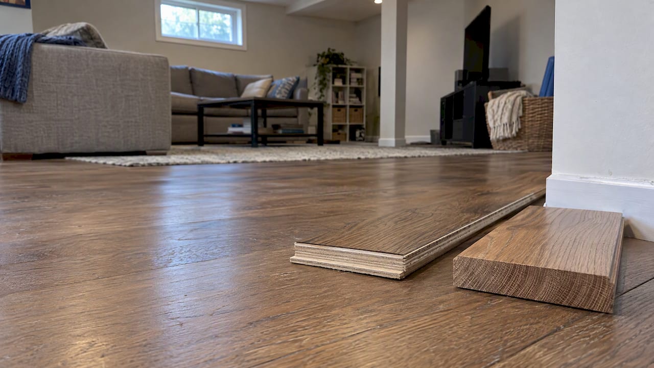 Engineered and solid wood boards in a basement